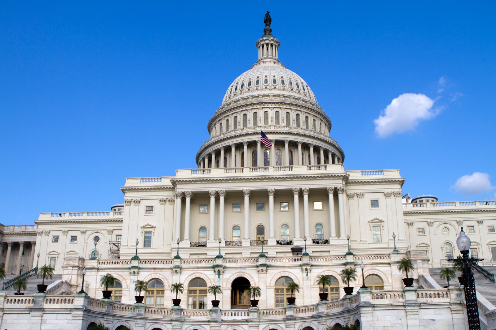 The United States Capitol Building in Washington, D.C., under a clear blue sky