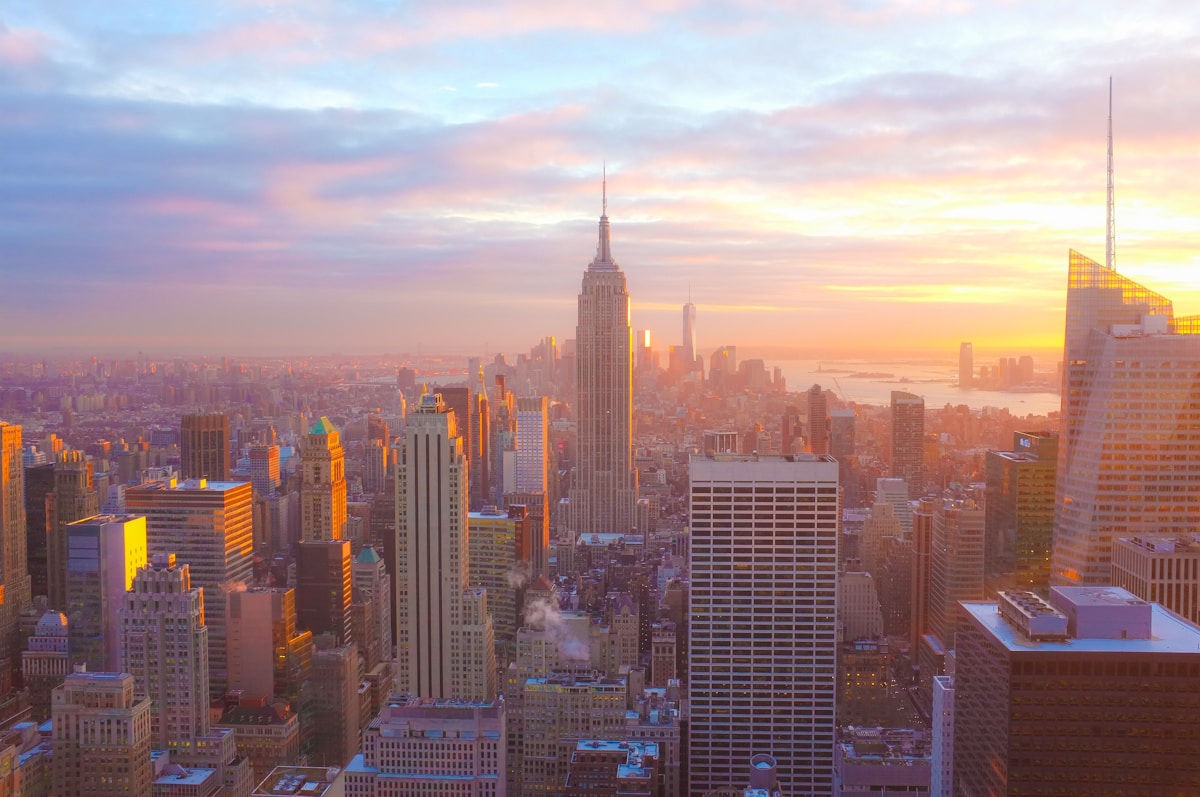 New York City skyline with cryptocurrency regulation concept
