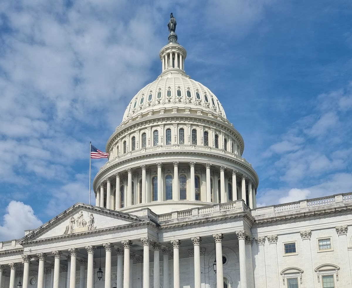 US Capitol building with American flag — crypto regulation 2026